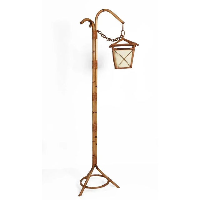 Amazing Mid-Century Modern bamboo and rattan floor lamp. This fantastic item was produced in Italy during the1950s. This...