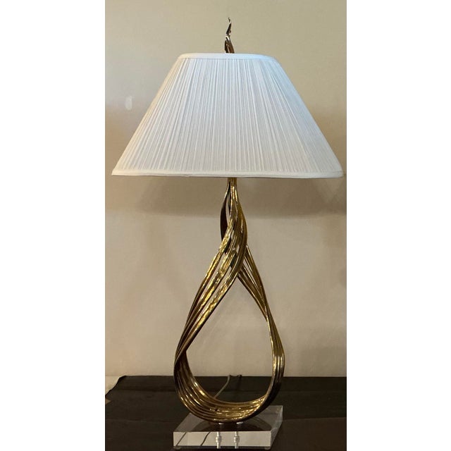 Beautiful pair of large scale lamps from a difficult to find series produced by Chapman, circa 1993. The stunning twisted...