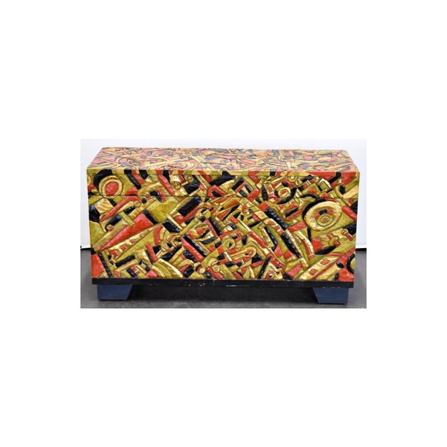 Carved and painted trunk dated 2006 is signed by the listed artist Tom Cramer (Oregon, 1960 - ) who is often called the...