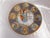 This is a plate marked Porcelaine Franklin and marked/signed in a name I cannot read. It also has some markings that seems...