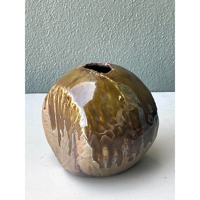 This striking vintage sculptural vase is a masterful example of Brutalist-inspired ceramic art, featuring a bold, high-...