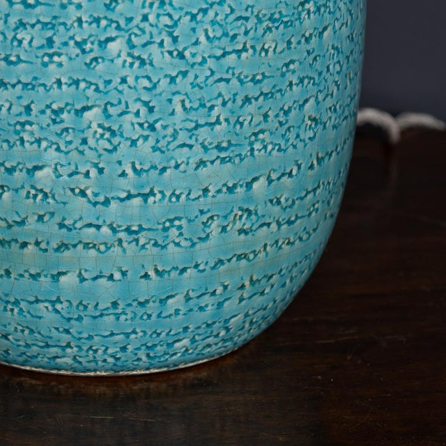 A stunning 20th century pair of french pale turquoise ceramic table lamps, beautifully matched with white textured...