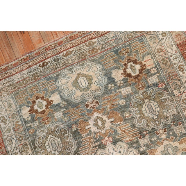 An early 20th-century scatter square size Persian Bidjar rug with an all-over design on a striated gray field, earth tone...