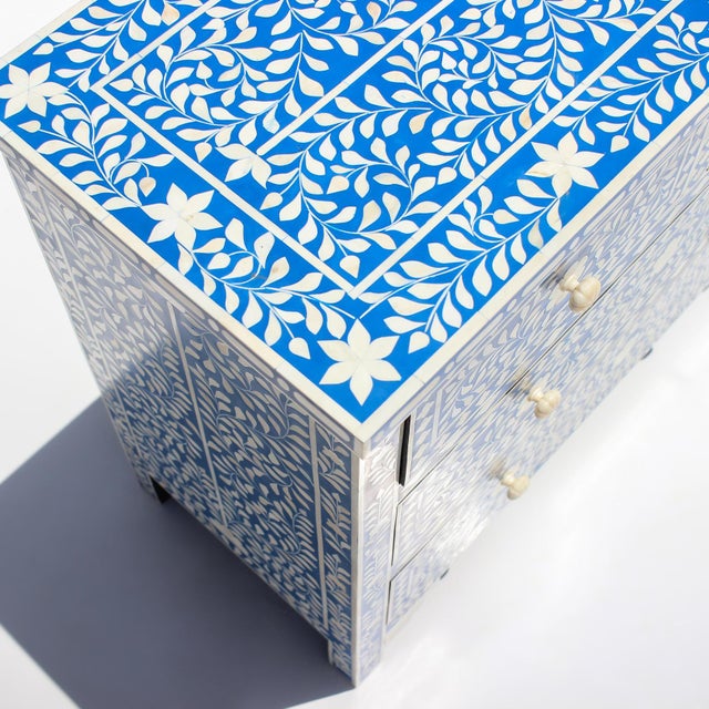 The Arabesque Bone Inlay Four-Drawer Chest presents an intricate interpretation of traditional floral ornamentation,...