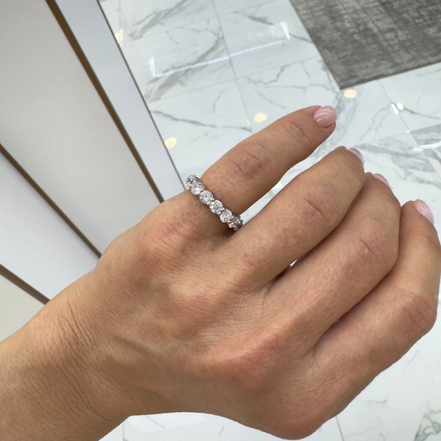 Gender: Ladies Metal Type: 14K White Gold Ring Size: 4 Width: 3.50 mm Weight: 3.80 grams Lady's rhodium-plated 14K white...