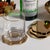 Elevate everyday entertaining with this set of polished metal beverage coasters, designed to offer both function and...