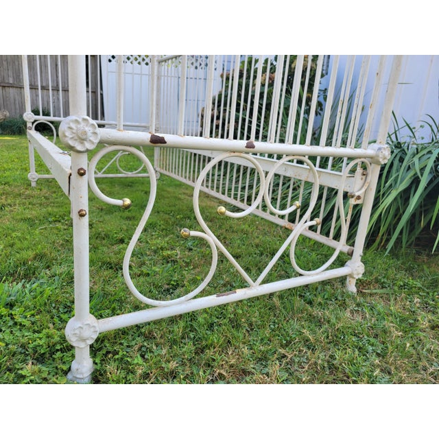 Incredible vintage iron daybed, beautiful details through out. Perfect for a sitting room or a lovely addition to home...