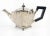 We are selling this great art deco style silverplate teapot with ebony wood fittings. Condition: Some wear, roughly cast...
