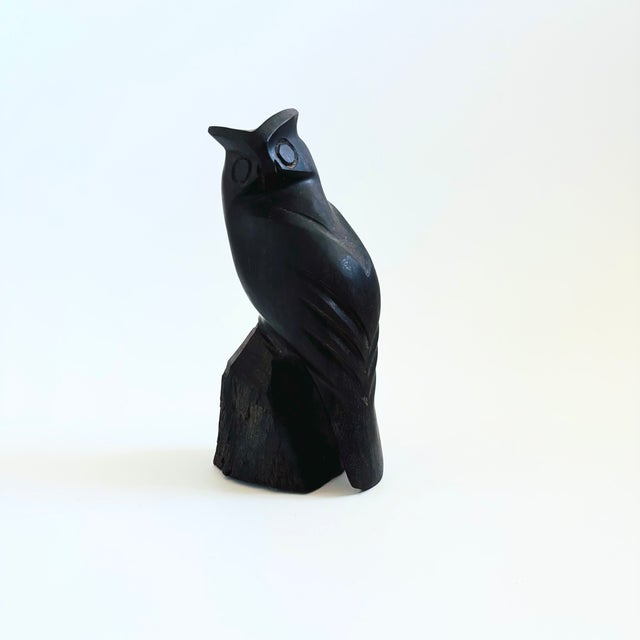 A vintage carved ironwood owl. Great detailing to the bird's features with a lovely dark natural grain and smooth finish...