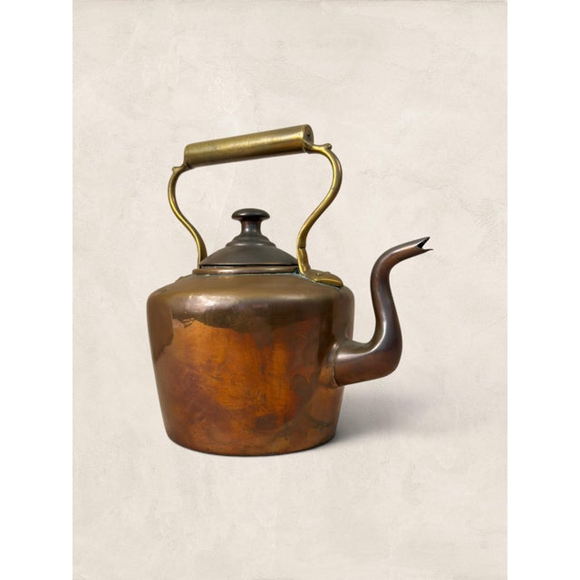 Copper kettles were a fixture of the Victorian and Edwardian kitchen, and this hand-hammered example has the kind of...