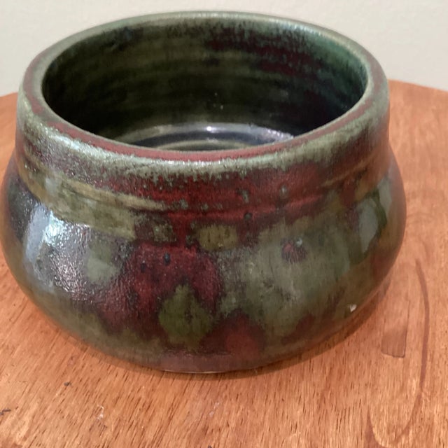 darkly and richly colored, beautifully glazed stoneware piece Wonderful and hard to find addition to any collection....