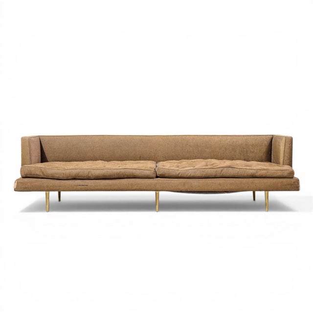 Edward Wormley for Dunbar Model 4907A Mid Century Brass Leg Sofa This sofa measures: 109 wide x 36 deep x 28.75 inches...