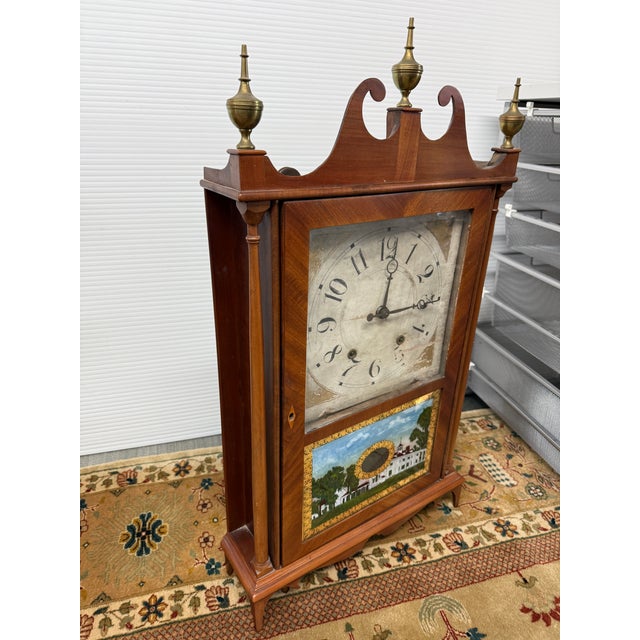 Design Plus Gallery presents a Pillar & Scroll Shelf Clock from Seth Thomas. This antique time piece is made from a...