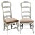 Lovely French ladder back hand carved chairs with a distressed mat white finish undercoats peak through the White the...