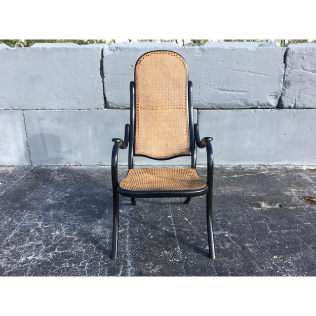 Original cane and black finish, stamped Thonet. Beautiful lines.