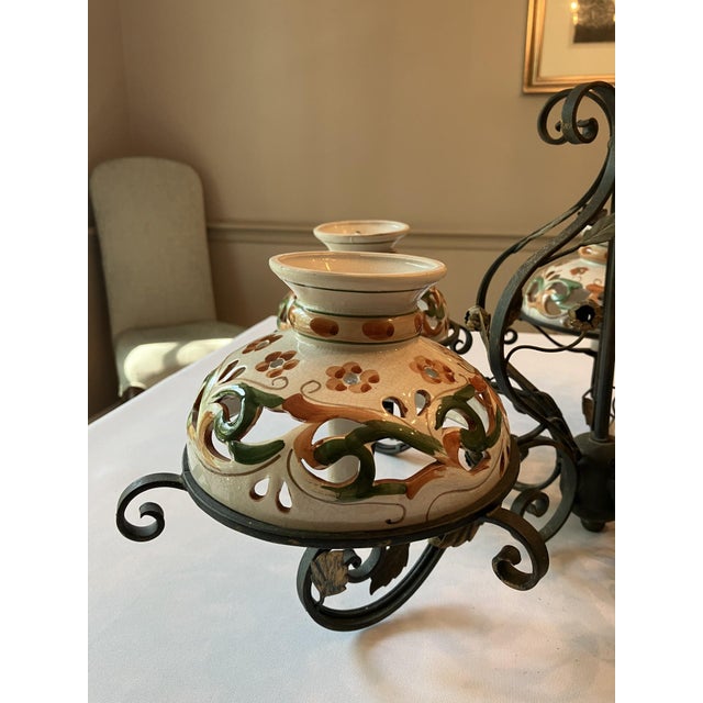 1980s Wrought Iron Chandelier With Italianate Ceramic Candle Covers For Sale - Image 5 of 9