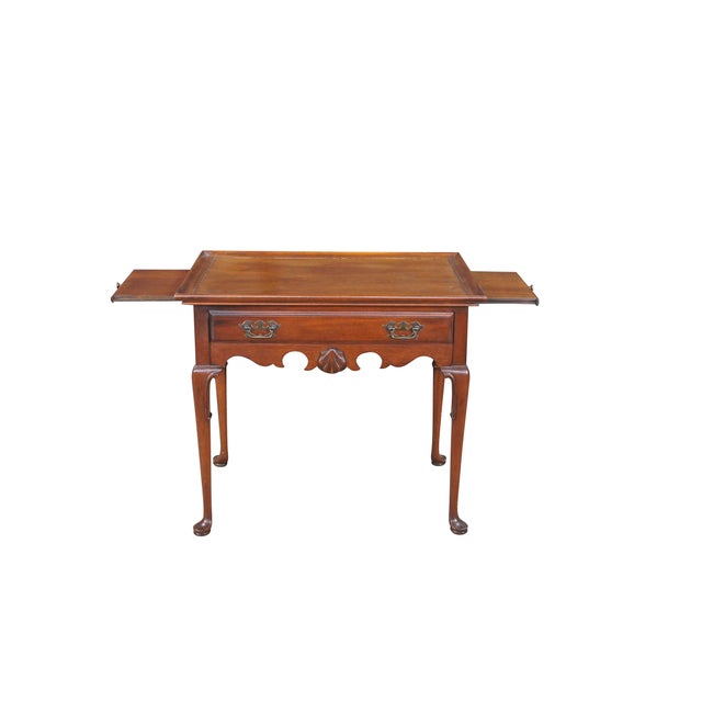 Vintage Queen Anne-style tea/accent table manufactured by the renowned Globe Furniture Company as part of their...