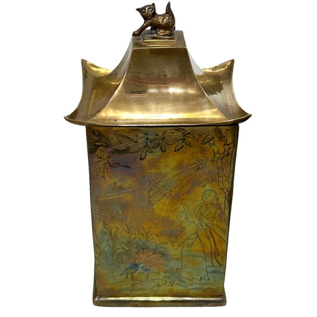 Etched brass tall box. Rectangular shape with pediment base. Heavy pagoda top with foo dog. Etched Chinoiserie pastoral...