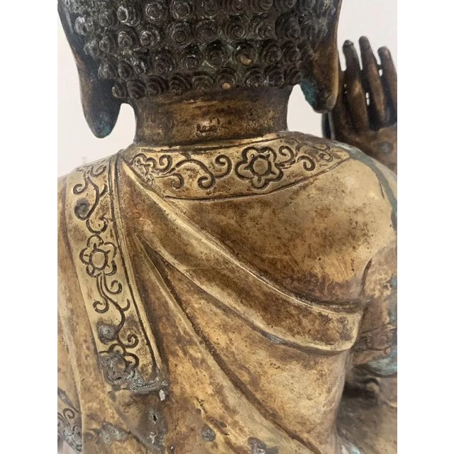 Antique Hindu Buddah sculpture in bronze. The piece is made in bronze, in some areas shows verdigris patina. Measurements:...