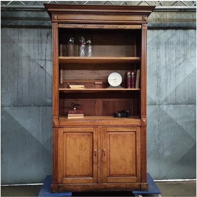 This stunning antique tambour cabinet once graced a distinguished notary’s office, offering both elegance and...