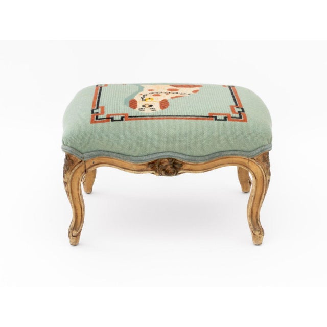 King Charles Cavalier Spaniel Motif Needlepoint Foot Stool, 1974, on painted carved wood legs, signed "PC" and dated lower...
