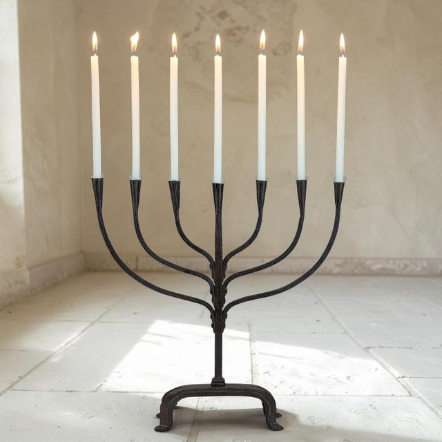 Sculptural in form and expressive in its craftsmanship, this mid-century French candelabrum was individually hand-forged...
