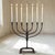 Sculptural in form and expressive in its craftsmanship, this mid-century French candelabrum was individually hand-forged...