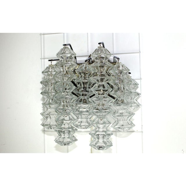 chrome hanging from each of 16 glass parts, each 5 frames E14, brass material I have official proof of authenticity such...