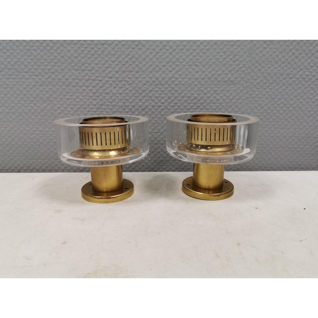 A set of extremely rare wall lamps by kay kørbing (the father of the famous saga lamps), designed for the ferry m/s...