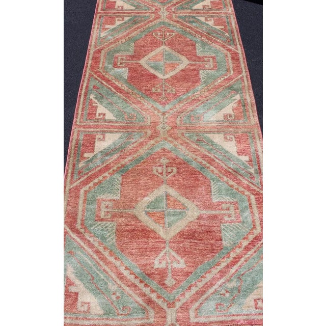 Vintage Turkish Oushak Runner With Coral Red, Soft Teal, and Warm Beige For Sale In Atlanta - Image 6 of 12