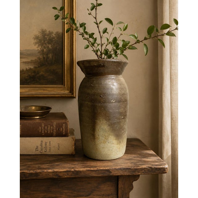 A wonderfully primitive antique North Carolina salt-glazed stoneware crock or storage jar, attributed to the historic...