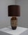 This 20th-century German ceramic table lamp is a celebration of pattern and texture. The lamp features a base adorned with...