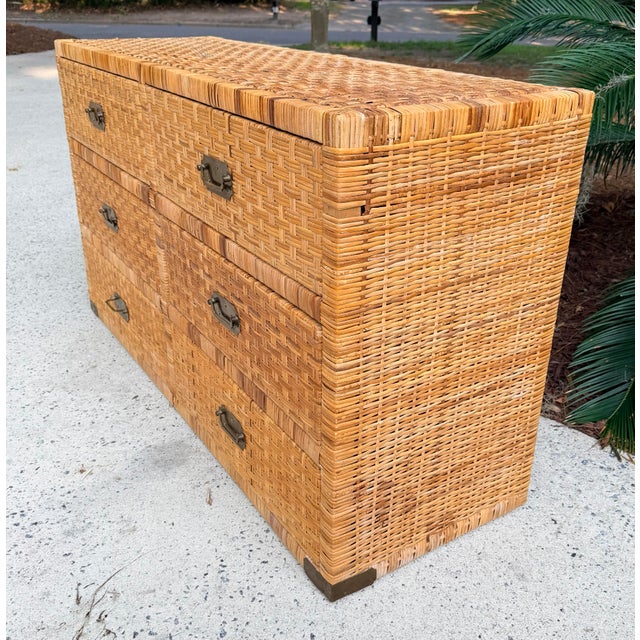 Charming island style wrapped rattan 6 drawer dresser. Perfect for a beach house. Brass campaign style hardware. Hand woven.