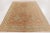 This antique 8x11 hooked rug is handmade in wool and originates circa 1920–1929. It features an elegant medallion floral...