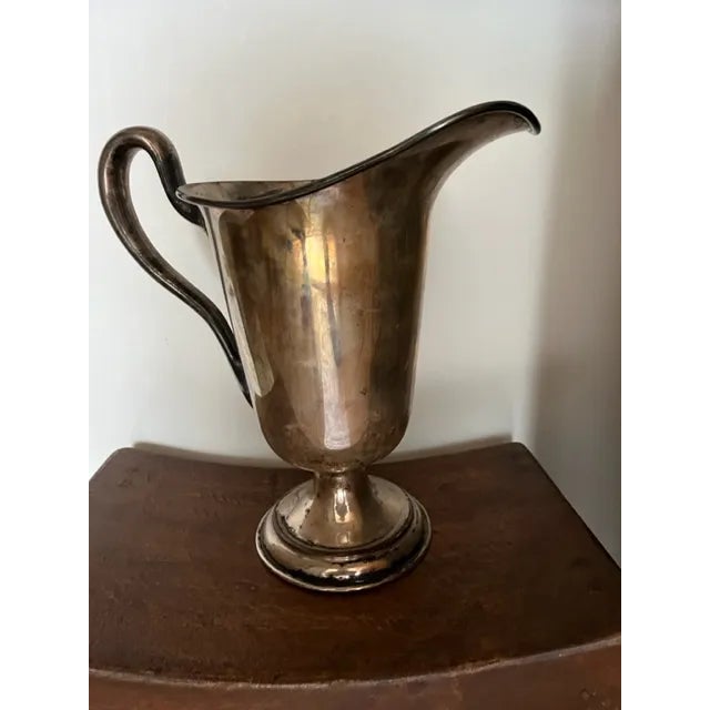 If you love patina, this trophy style wine/water pitcher/vase is for you. It is quite large, has some imperfections, but...