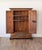 A rare Alpine Bauernschrank from the Austro-Tyrolean tradition, painted in the rococo folk idiom that flourished across...