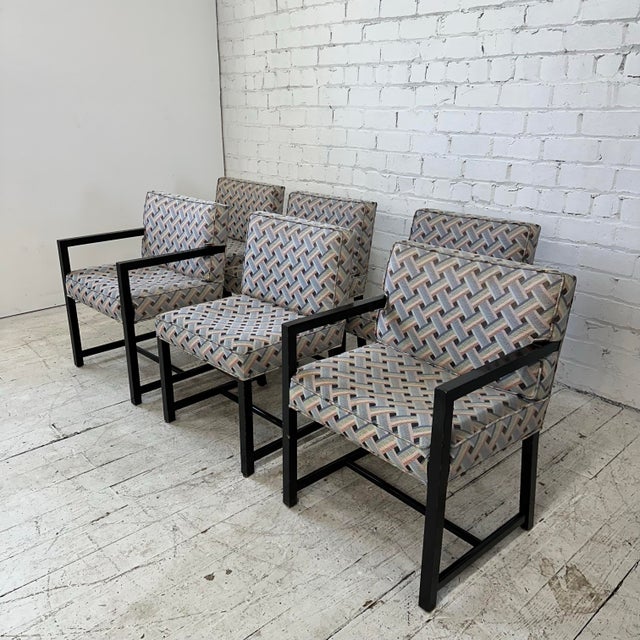 Set of 6 dining chairs styled after Dunbar featuring 2 arm chairs and 4 side chairs with ebonized wood and currently...