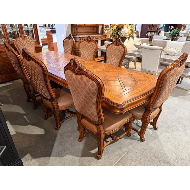 Make a grand statement with this AICO Amini Tuscano dining set, an impressive ensemble that celebrates Old World...