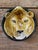 Striking vintage sculptural wall plate featuring a hand-painted lion rendered in rich, dimensional glaze. Crafted in...
