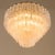 This vintage murano glass chandelier, based on the glass work, was made in the 1960s by the venini. The shades are the...