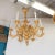 Giltwood woodcarving chandelier with intricately detailed foliate motif by master woodworker Carlos Villegas