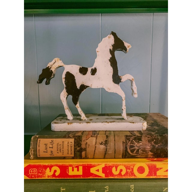 This unique vintage folk art style horse art decorative sculpture is modern in line and graphic style while maintaining...