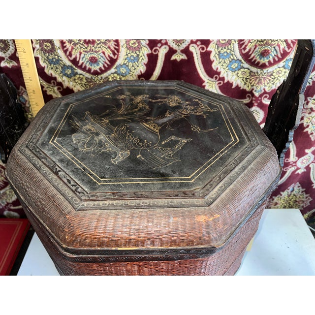 Beautifully aged rattan 3 sectional Chinese basket. Most likely a wedding basket given to the newlyweds as a gift. This...