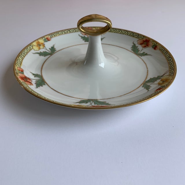This pretty vintage piece is hand painted Nippon with a gold-gilt looping border and gold dots outlining the coral and...