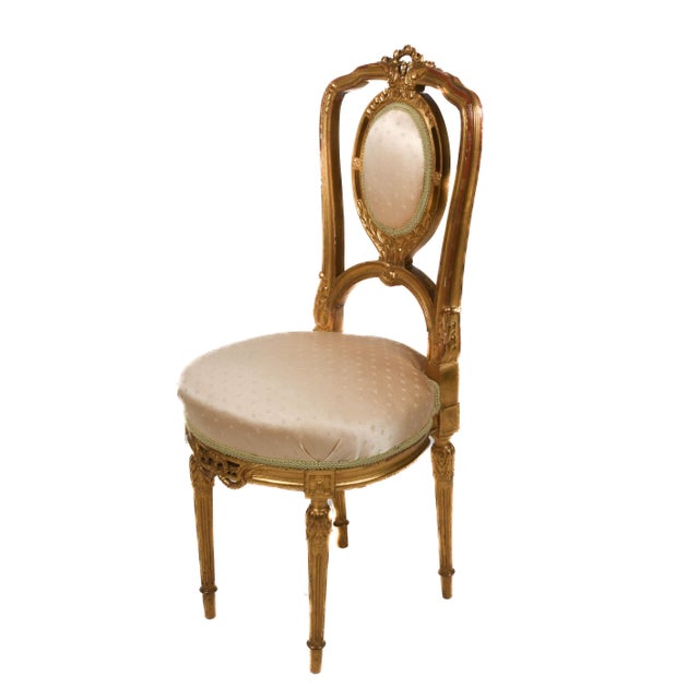 Graceful and refined, this Antique French Ladies Slipper Chair whispers of 19th-century elegance. With its delicately...