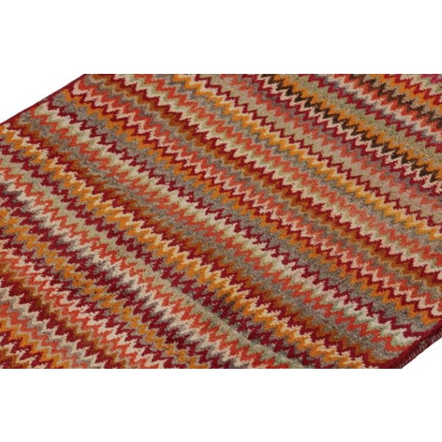 This vintage 3x5 Persian rug is a mid-century tribal piece, hand-knotted in wool circa 1950-1960. Its design enjoys...