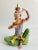 Gorgeous Hollywood Glam Palm Beach-style hand-decorated porcelain figurine of a Genie. Beautifully hand-painted in green,...