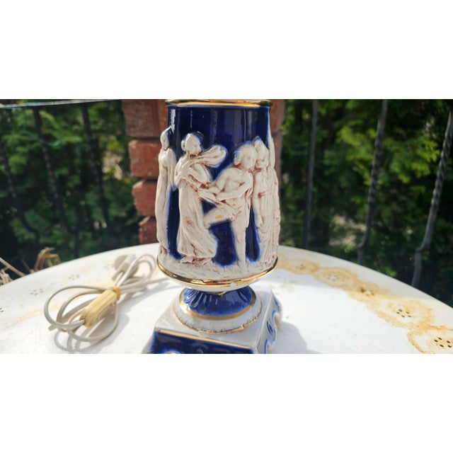 Capodimonte porcelain lamp, 1960s-1970s, dimensions: height: 47.5 cm, diameter: 26 cm. European Plug (up to 250V).The...