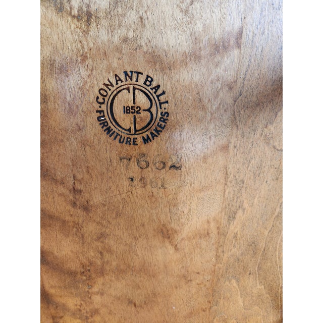 A classic mid-century mordern spindle back Conant Ball rocking chair. Original vintage.