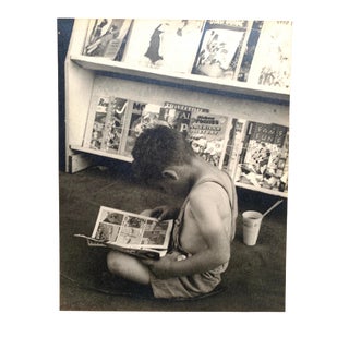 1940s "Child Reading Comics" Black and White Photograph For Sale